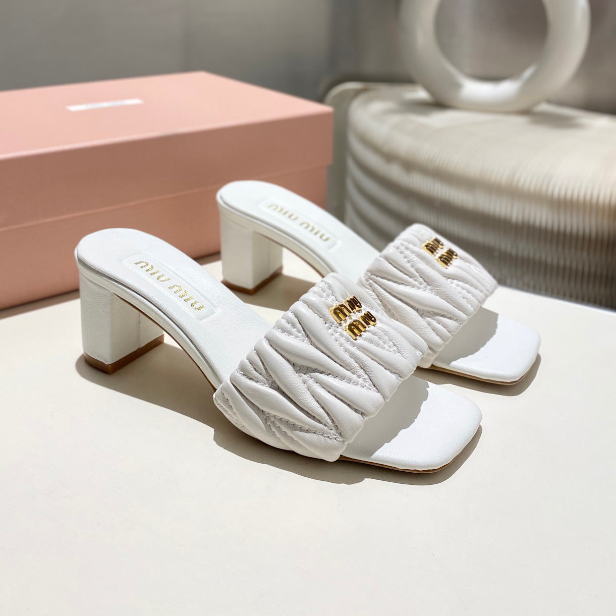 MM Matelassé nappa leather slides 1825070102