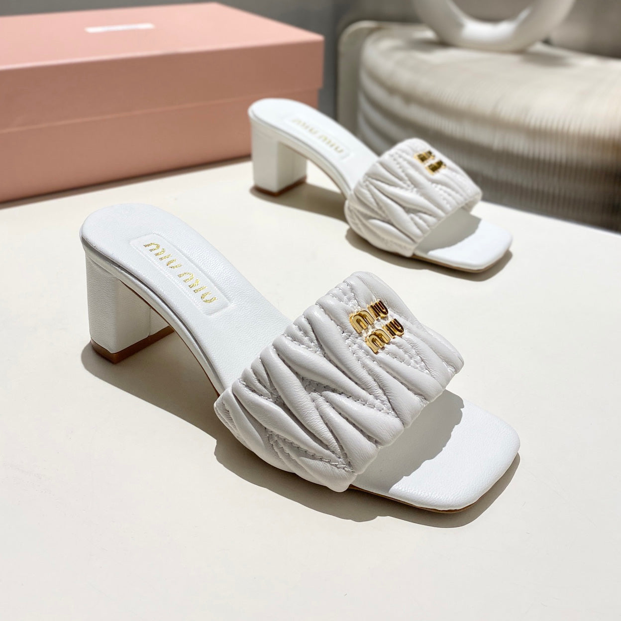 MM Matelassé nappa leather slides 1825070102