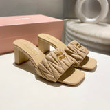 MM Matelassé nappa leather slides 1825070102