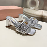 MM Matelassé nappa leather slides 1825070102