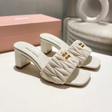 MM Matelassé nappa leather slides 1825070102