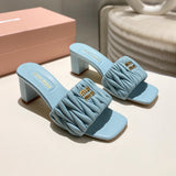 MM Matelassé nappa leather slides 1825070102